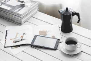 Technology, tablet, coffee cup — The Art of Crowd Management in Karaoke Hosting